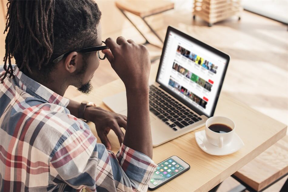 African American man using laptop